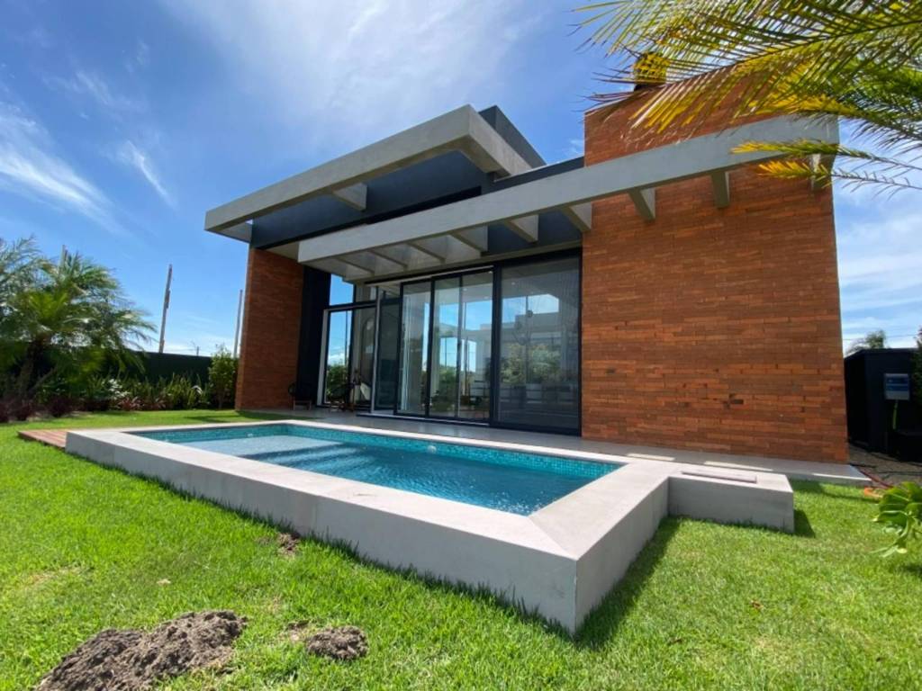 Casa em Condomínio 4 dormitórios para venda, Parque Antártica em Capão da Canoa | Ref.: 26944